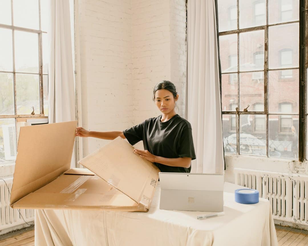 Small business owner preparing products for online orders