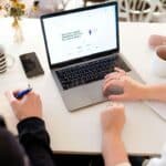 Marketing team reviewing a digital marketing agency proposal in an office