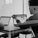 Team planning a business website around a table