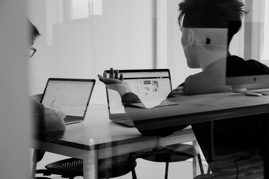 Team planning a business website around a table