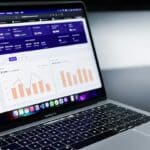 SEO performance report with analytics charts on a laptop screen