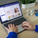 How to Choose an Ecommerce Platform in Malta: A Buyer’s Checklist 1 Business owner reviewing an ecommerce store design on a laptop