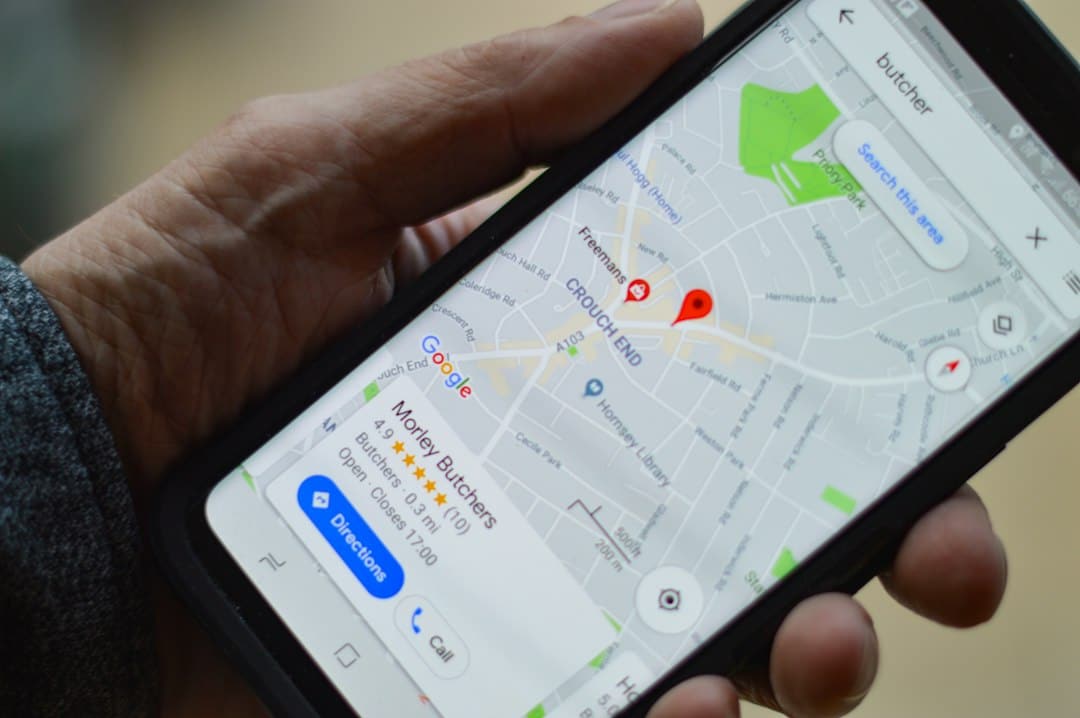 Digital Consulting Pros - Digital Marketing Agency Malta 11 Hand holding a smartphone displaying a digital map and location pin