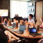 Team reviewing an SEO agency onboarding plan for a Malta business
