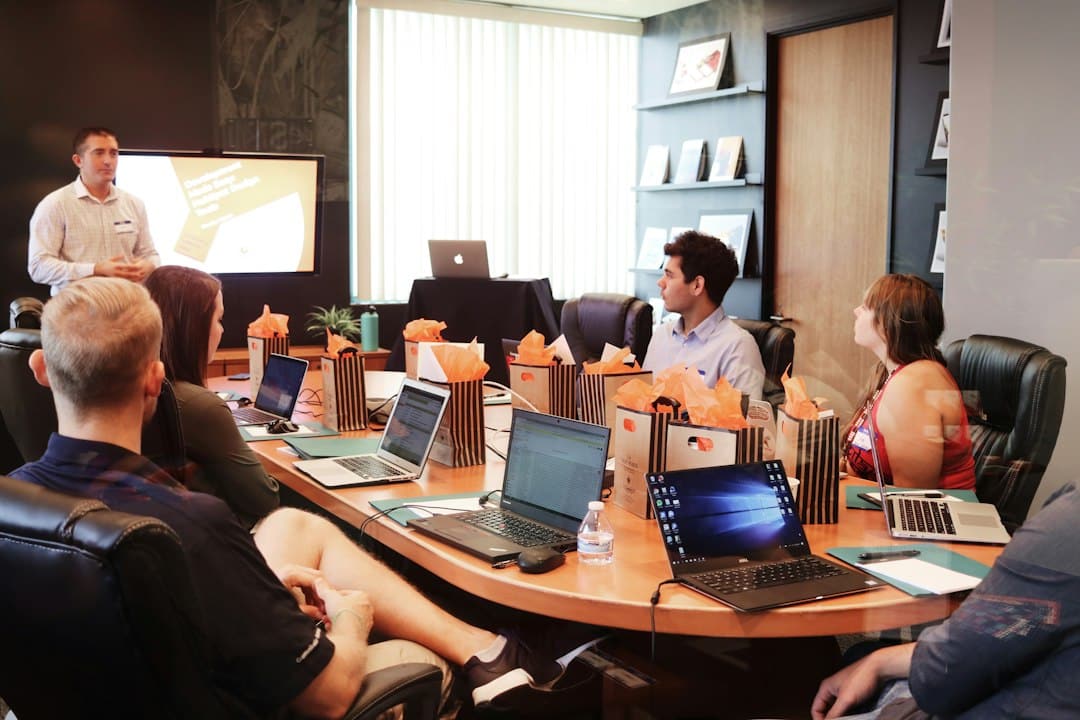 Team reviewing an SEO agency onboarding plan for a Malta business